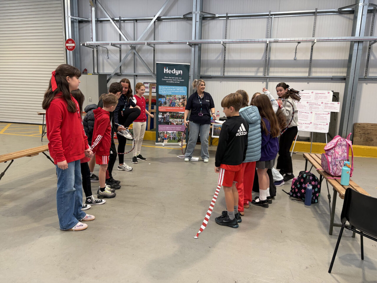 Group of school children at Hedyn's stand to learn more about ASB