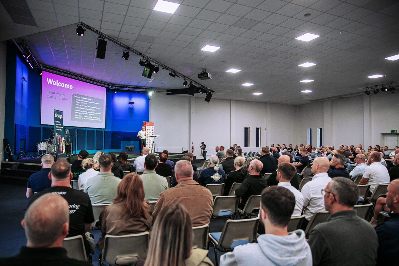 Hedyn colleagues and suppliers sat down together having a presentation about our procurement event.